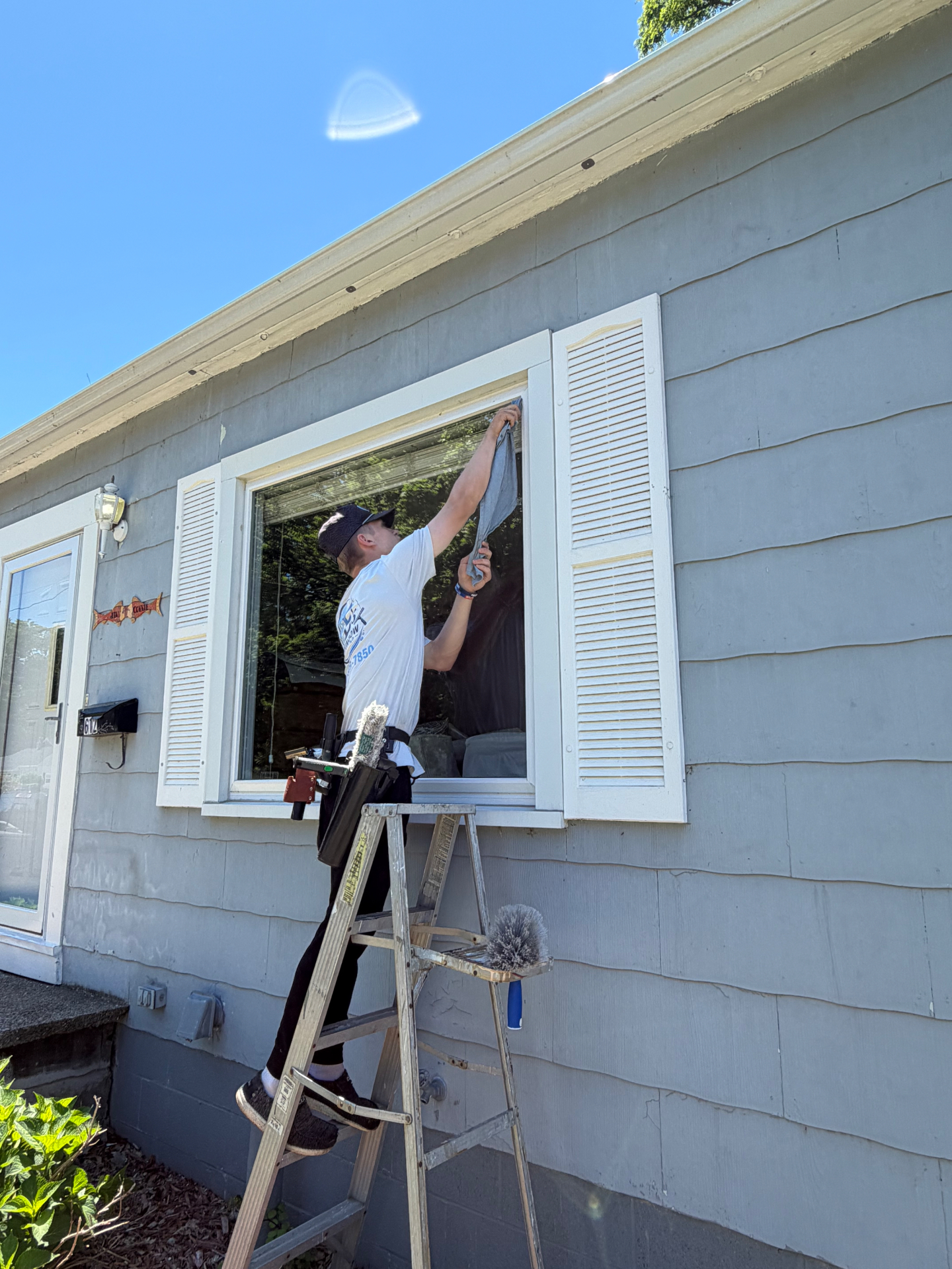 Ethan washing windows